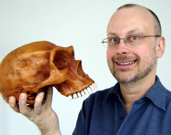[Robert J. Sawyer with Neanderthal skull]