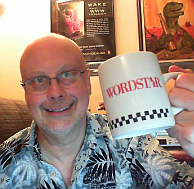 [Robert J. Sawyer holding WordStar mug]